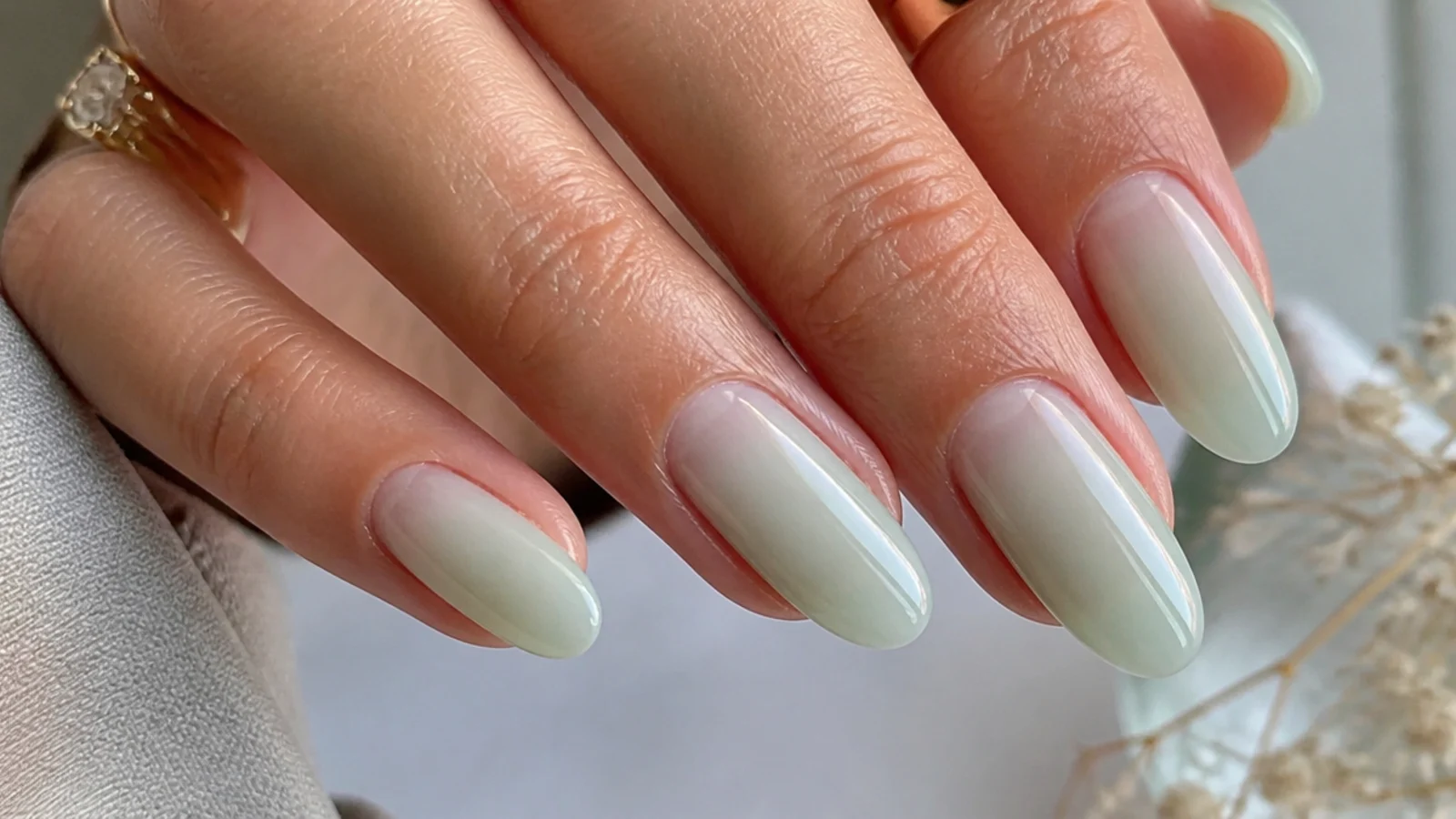 Long oval soap nails in a barely-there sheer mint green wash