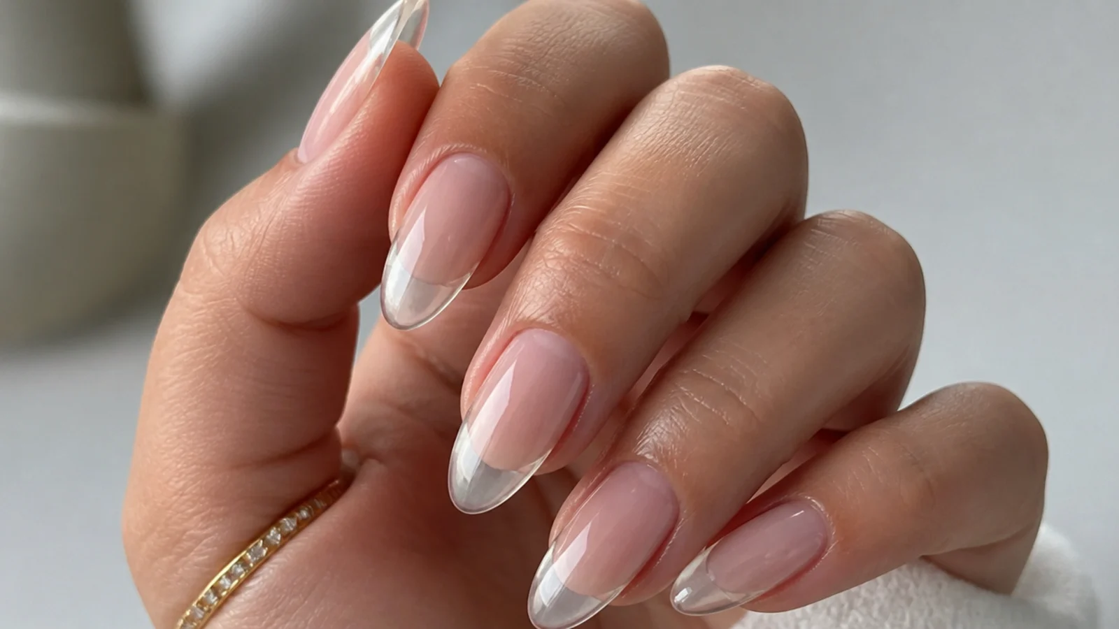 Long sheer soap nails on an almond shape with translucent free edge
