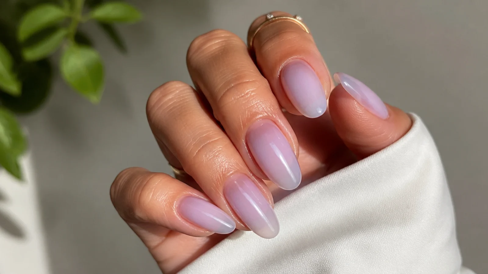 Sheer milky lavender-tinted soap nails on almond nails