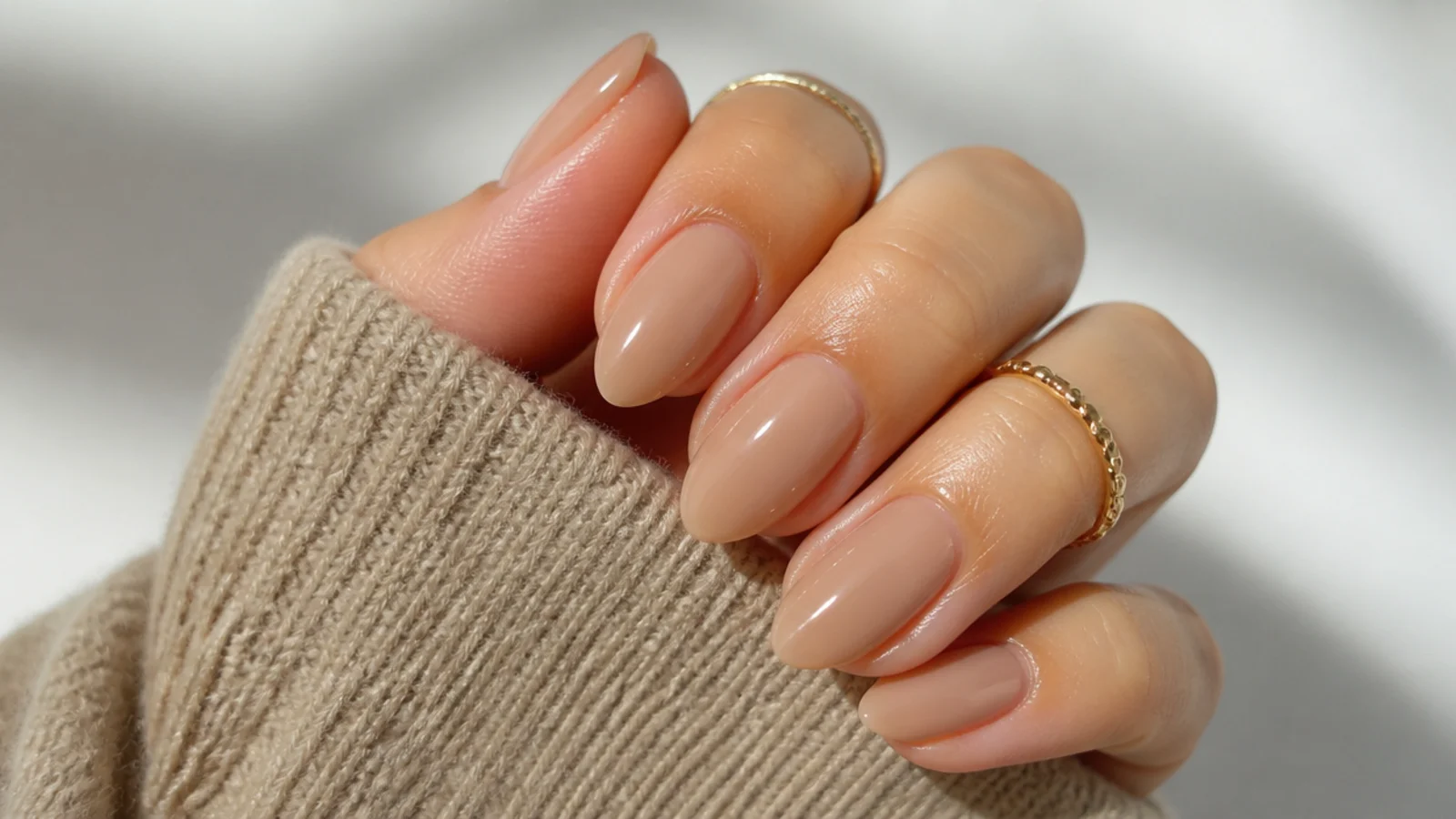 Sheer warm coffee-nude OPI soap nails on medium almond nails