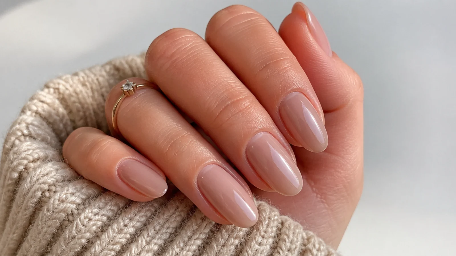 Sheer soft taupe-nude OPI soap nails on medium almond nails, applied thin