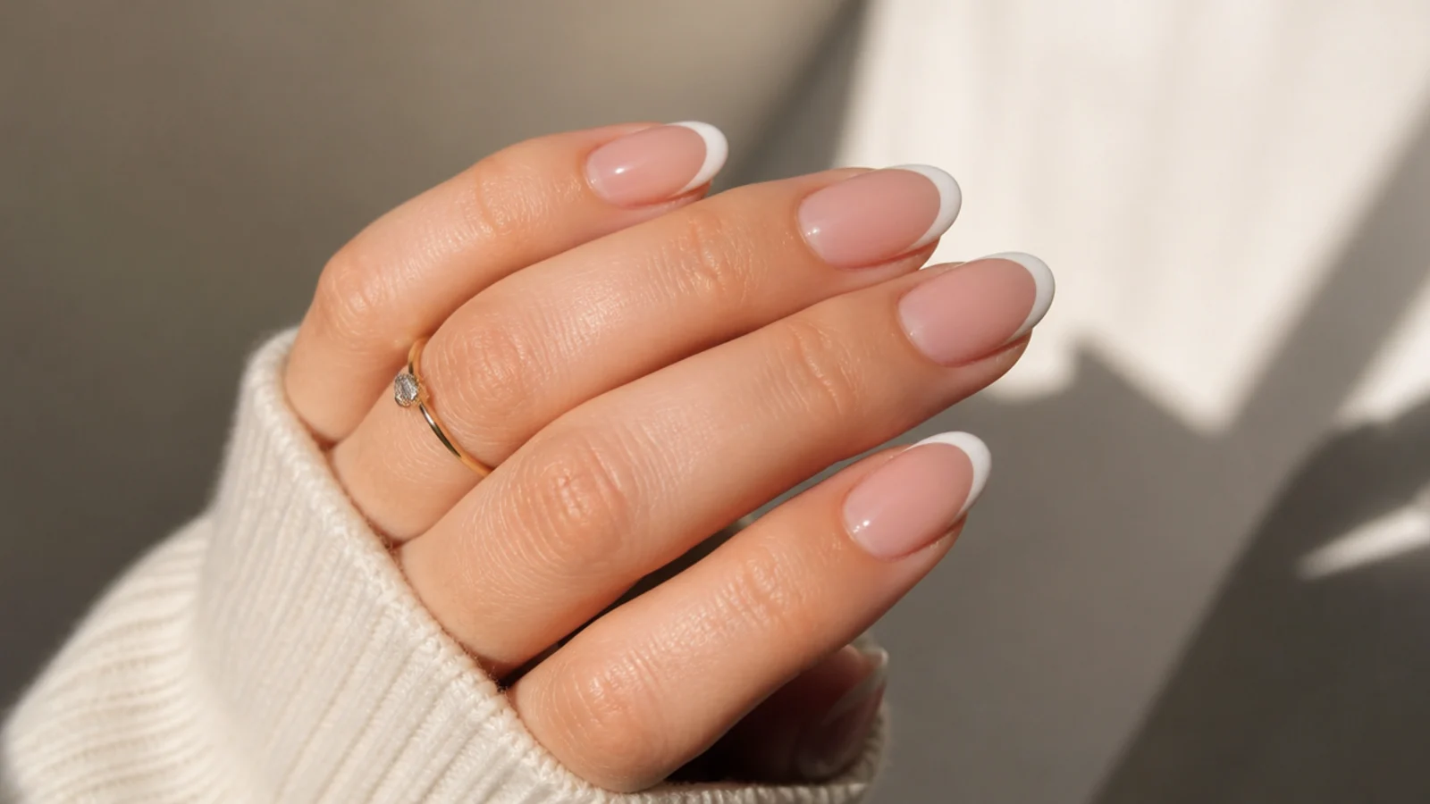 Sheer oval soap nails with a soft milky white French tip