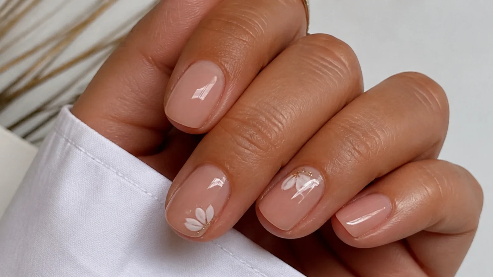 Short soap nails in a sheer warm nude that flatters medium skin tones