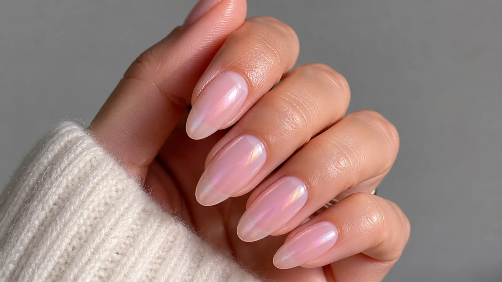 Barely-there sheer pink soap bubble nails with soft iridescent shimmer