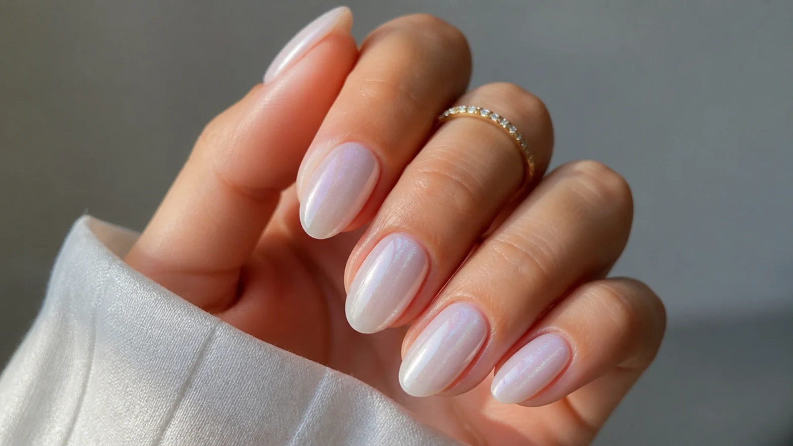 Sheer milky-white soap nails with a soft iridescent shimmer
