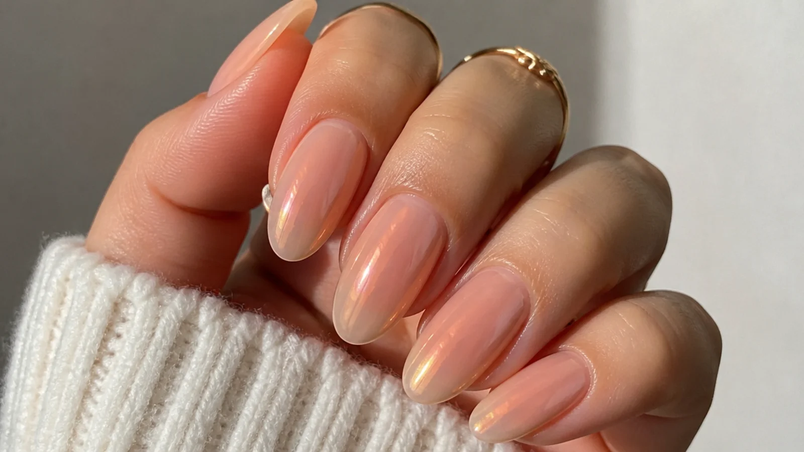 Sheer peach soap nails with a warm iridescent glow