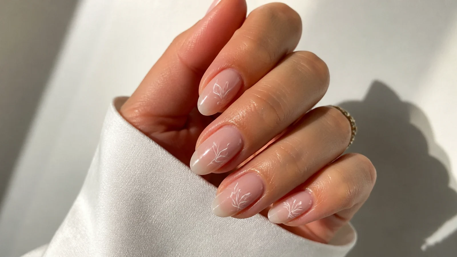 A well-sealed sheer soap manicure with cuticle oil for longevity