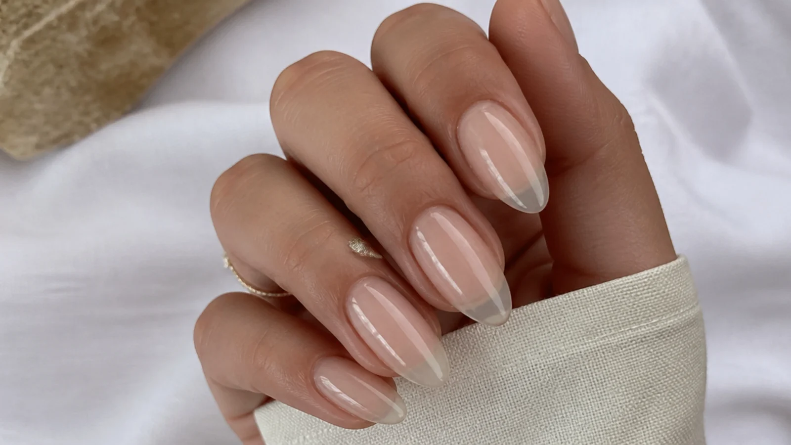 Ultra-sheer glassy soap nails on buffed almond tips with the free edge showing through