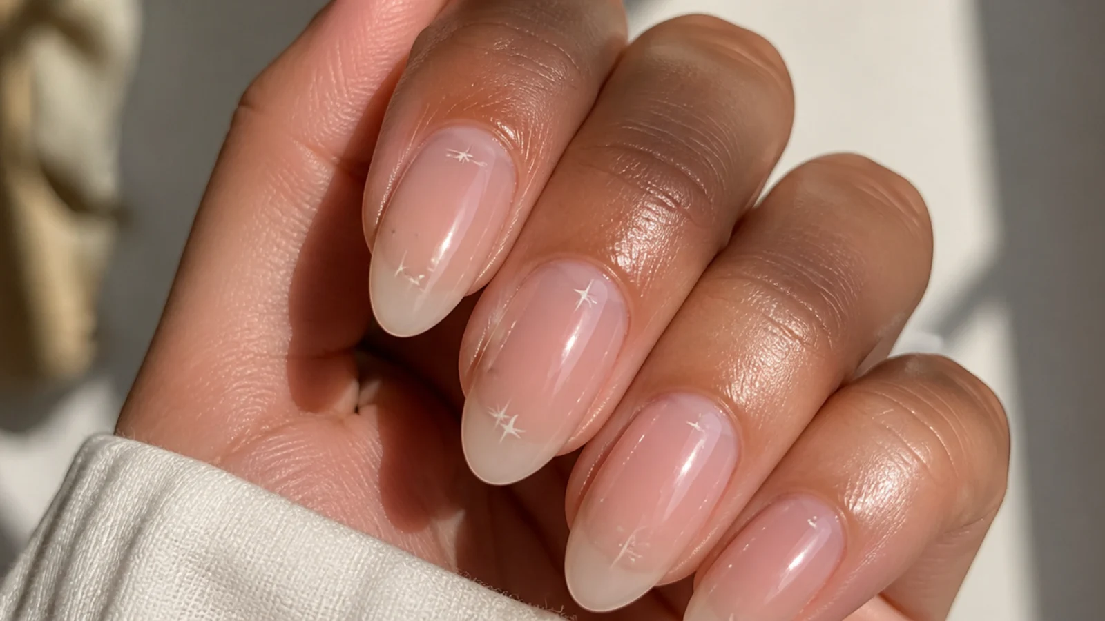 A well-sealed sheer soap manicure with cuticle oil for longevity