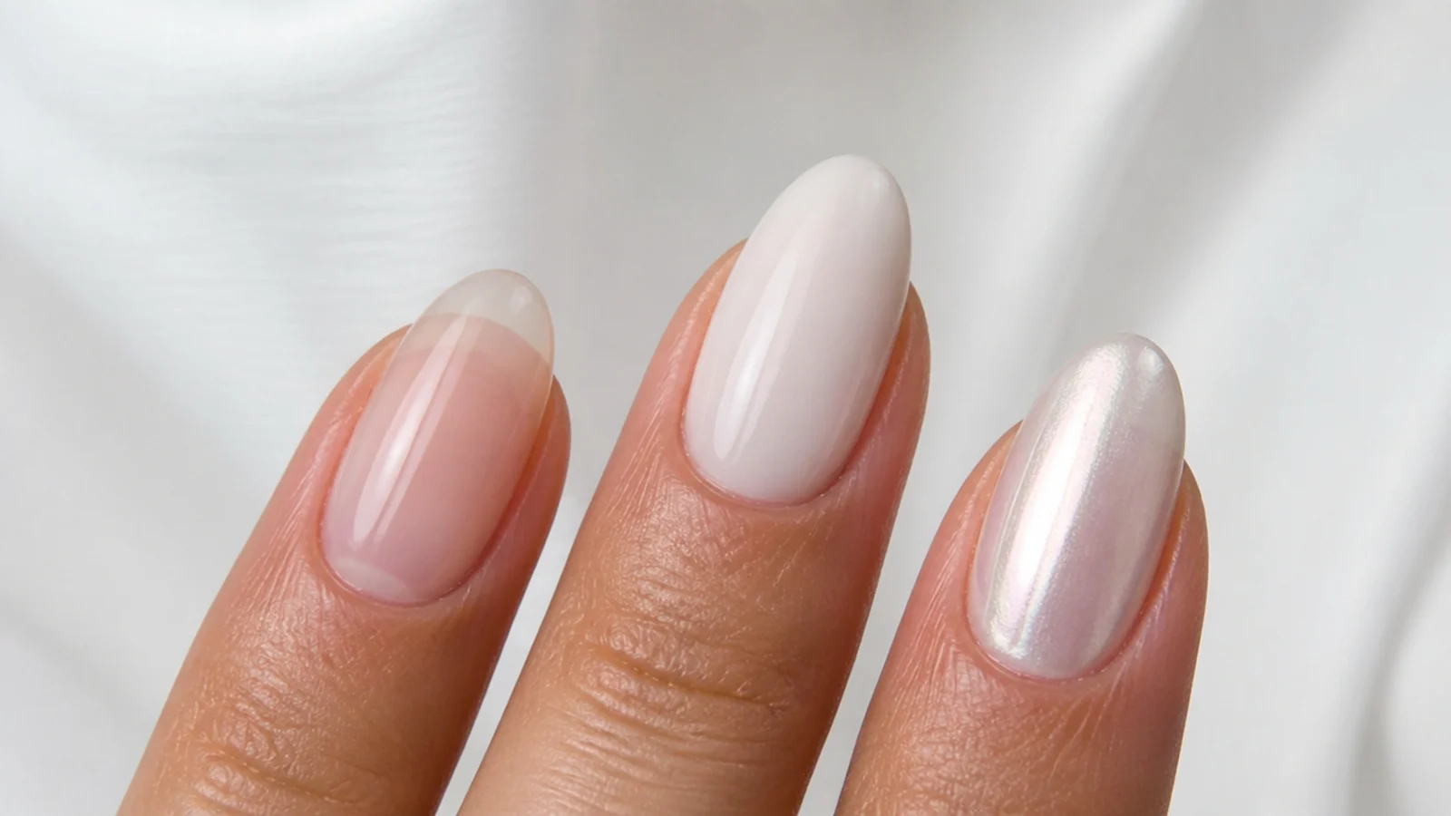 Three nails side by side showing sheer soap, opaque milky and pearl glazed finishes