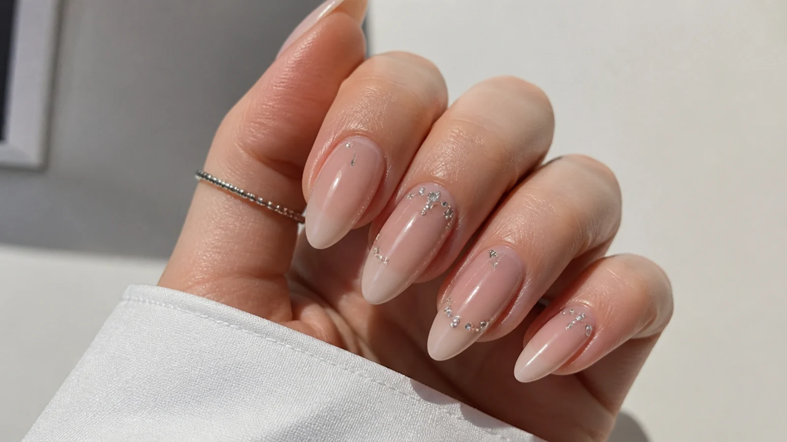 Long tapered almond soap nails with a sheer glassy finish