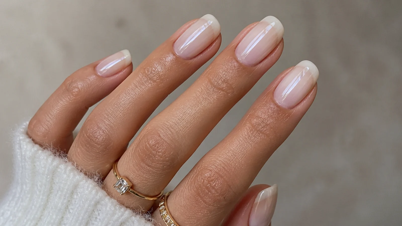 Sheer milky white nails with a soft pearl chrome glazed-donut glow