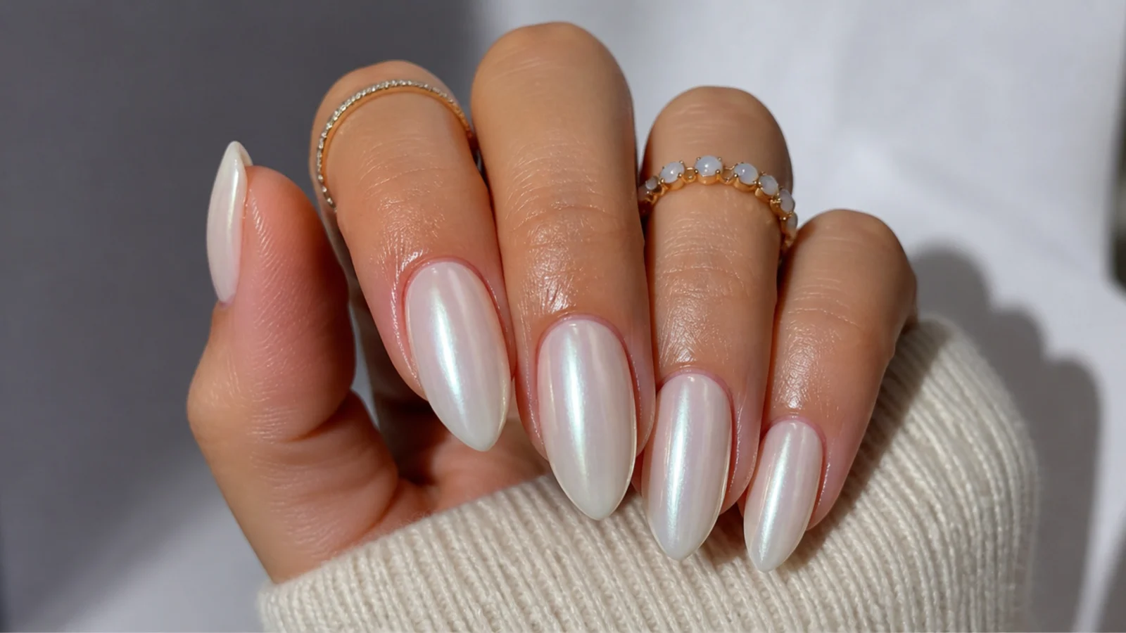 A well-sealed off white chrome manicure with cuticle oil for longevity