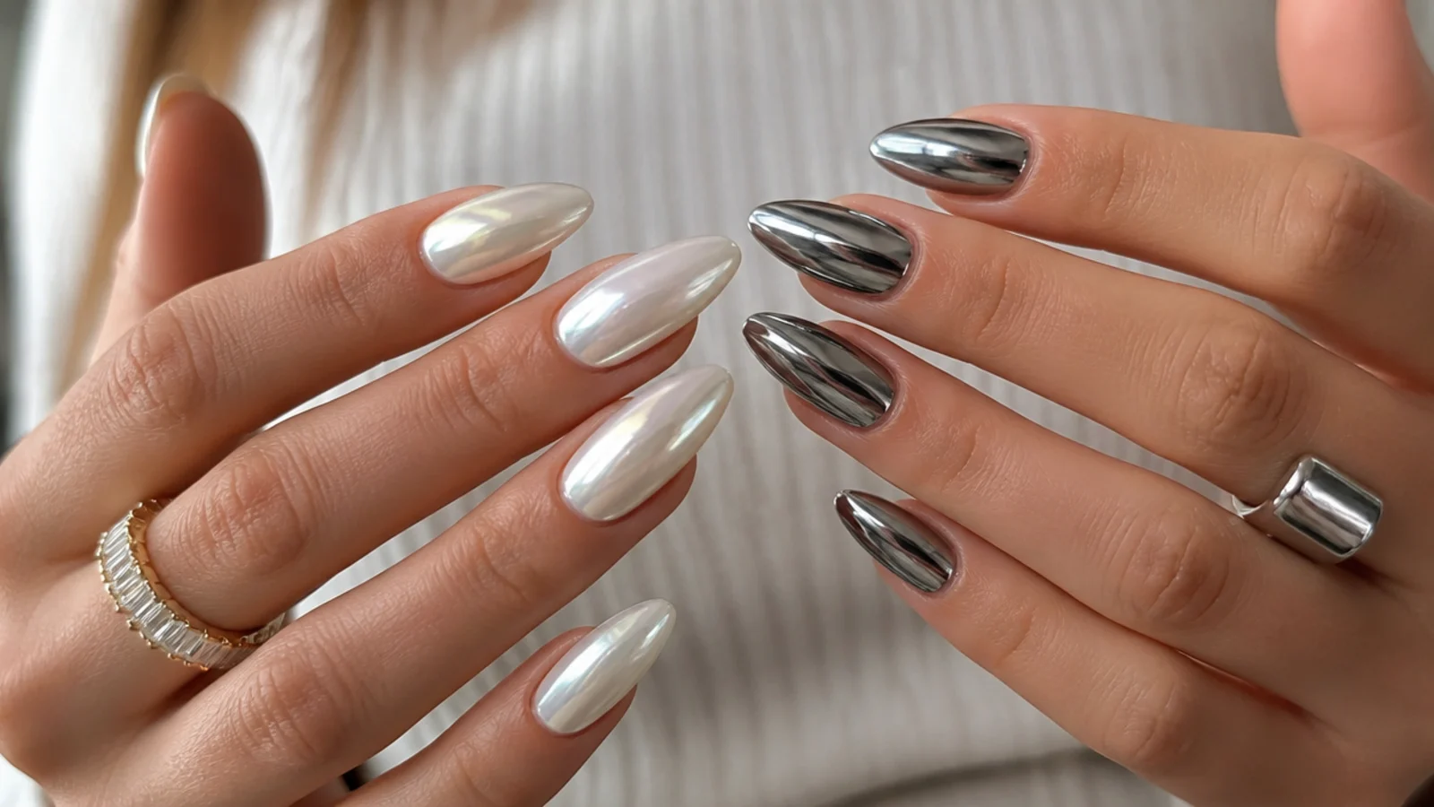 Milky white pearl chrome nails next to darker gunmetal silver chrome nails