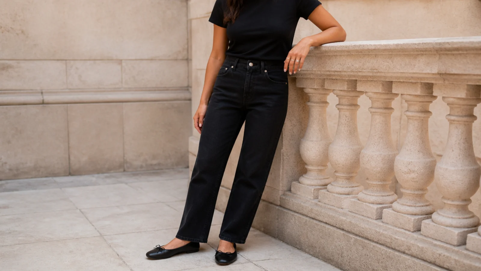 Faceless casual outfit with a fitted black cotton tee, black straight-leg jeans and black ballet flats