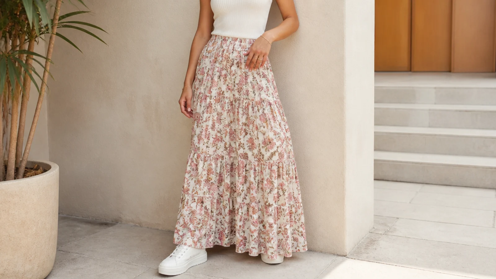 Faceless outfit with a floral maxi skirt, a fitted tank and chunky white platform sneakers