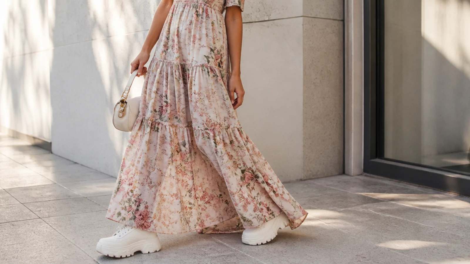 Faceless outfit showing a bulky white platform sneaker looking heavy under a soft flowy maxi dress