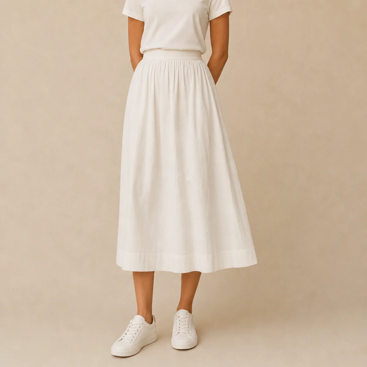 Faceless full-length shot of a white skirt with a tee and white sneakers